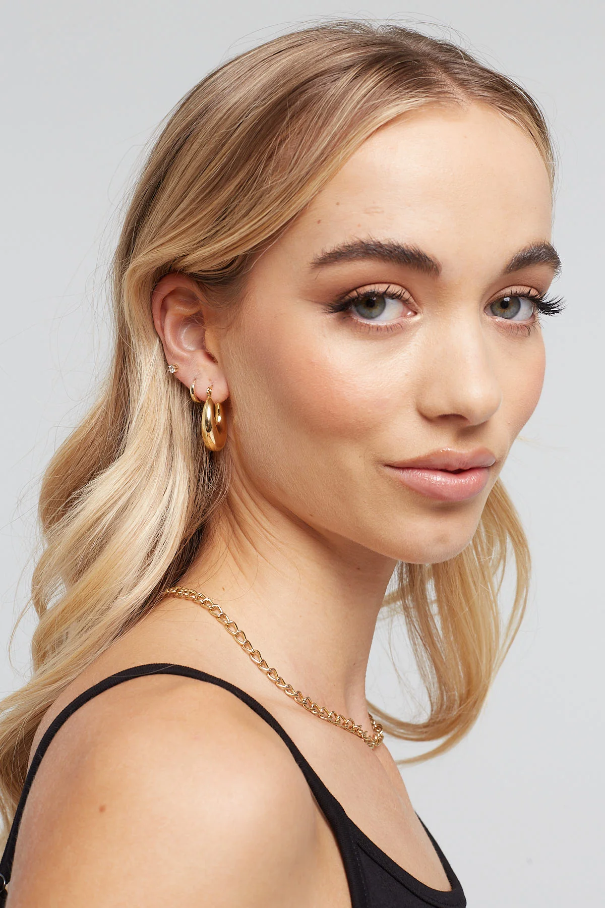 Perfect Stranger Thick Medium Hoop Earrings Gold Plated - Image 4